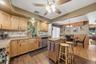An open floor plan between the kitchen and dining room makes serving a meal a breeze.