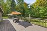The back deck conveniently wraps around to the kitchen back door.
