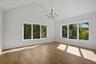 Primary bedroom with 14ft ceilings