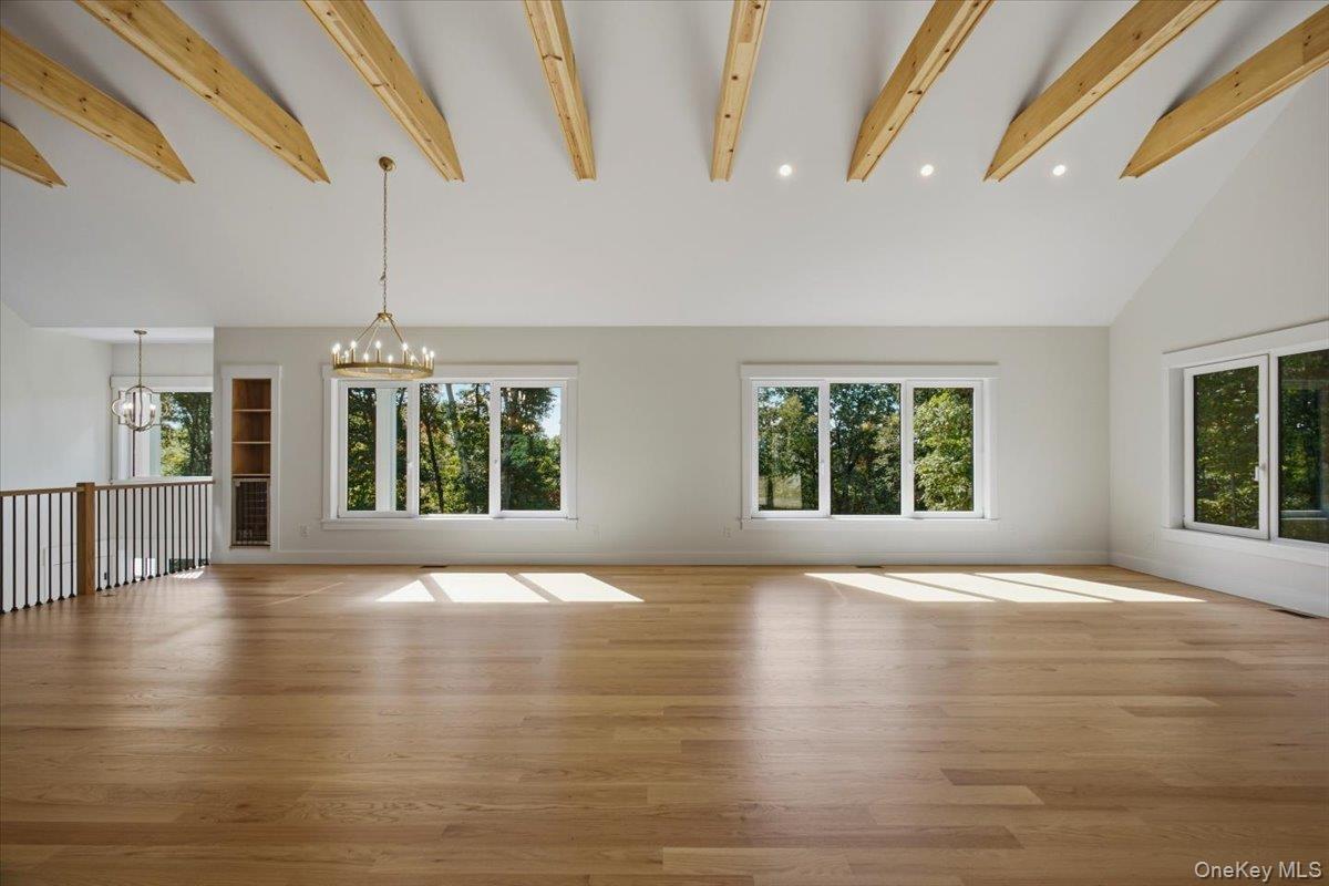 Dining Area with wine fridge and built ins