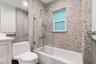2nd Bedroom with Ensuite Bathroom and Natural River Rock Wall