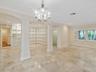 Living Room with Views to Front and Back Gardens. Dining Room is Open to Living Room.