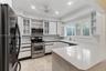 Corner View of Large Gourmet Kitchen. Lots of Sunlight