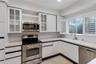 Generous Counter Space and Pool Views From All Kitchen Angles