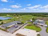 Clubhouse aerial, virtually staged, parked cars removed