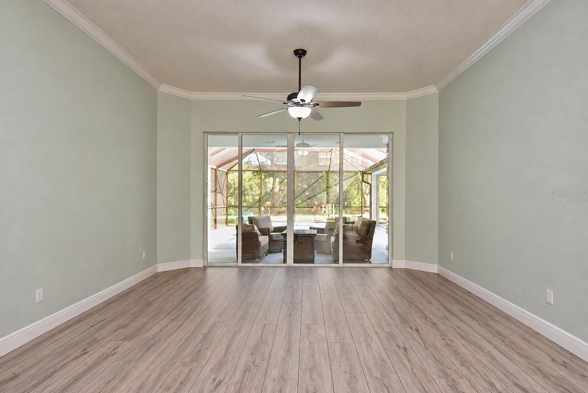 Front living room, virtually staged, gym equipment digitally removed