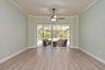Front living room, virtually staged, gym equipment digitally removed