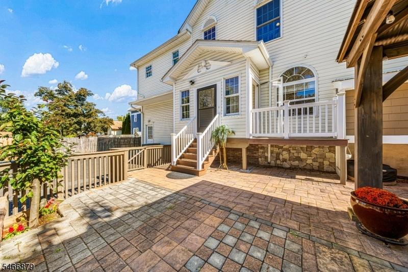 Rear Exterior and Paver Patio