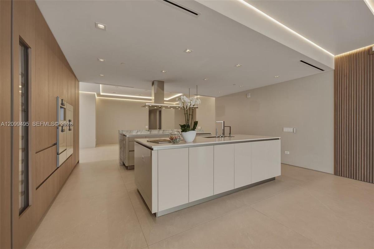 Snaidero® Italian custom cabinetry in kitchens along with imported Italian stone countertops.