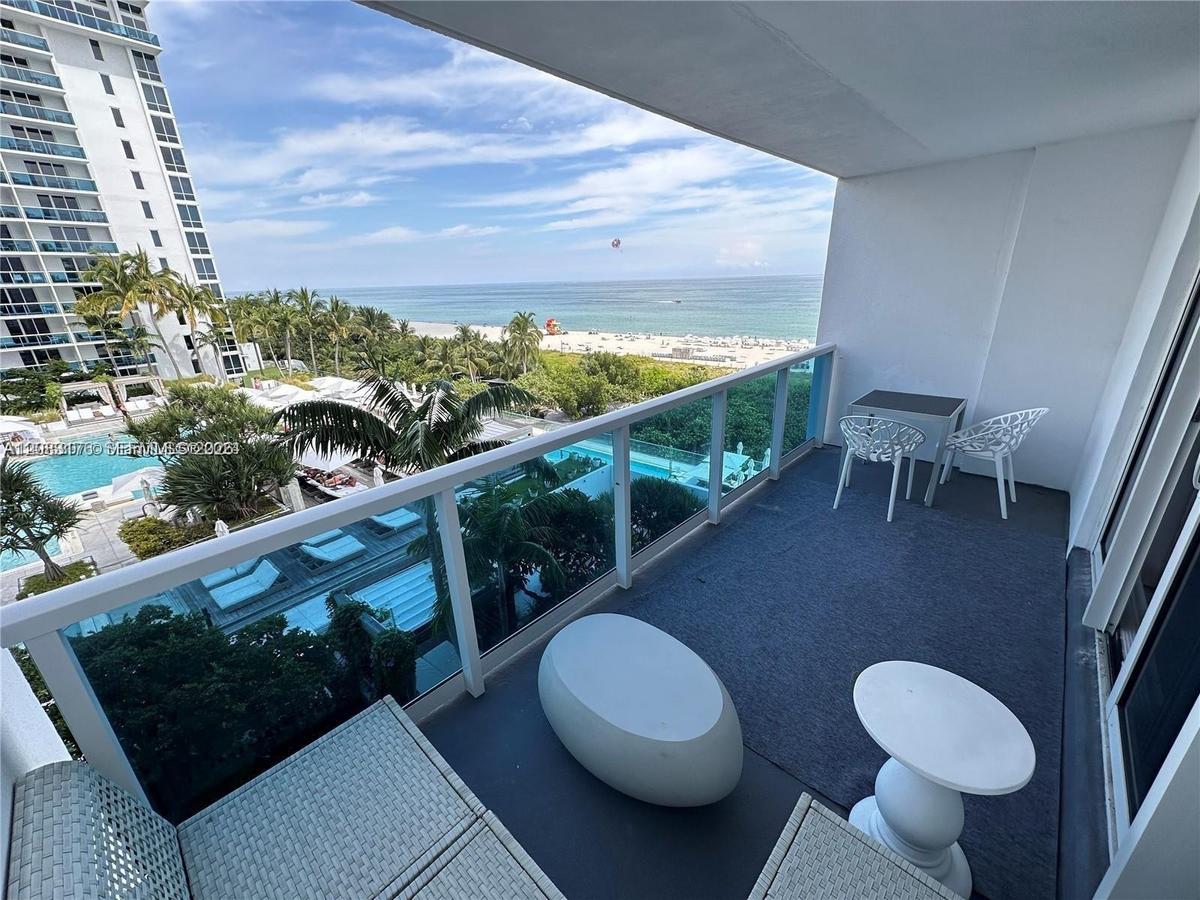 A unique unit with balcony faving the One Hotel Pools and the Ocean