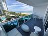 A unique unit with balcony faving the One Hotel Pools and the Ocean