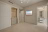 Second en-suite bedroom with custom made lighted closet.