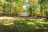 The open yard, with the house tucked in behind