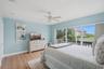 Lower level guest bedroom with private entrance and ensuite full bath.