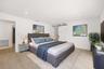 Designed as a true private guest retreat, this spacious suite offers exceptional comfort, privacy, and direct access to the backyard through oversized