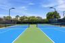 Enjoy one of the community's most popular amenities with beautifully maintained pickleball courts featuring covered seating, providing the perfect pla