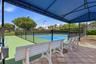 Enjoy one of the community's most popular amenities with beautifully maintained pickleball courts featuring covered seating, providing the perfect pla