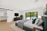 Designed as a true private guest retreat, this spacious suite offers exceptional comfort, privacy, and direct access to the backyard through oversized