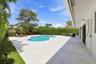 Discover your own private backyard sanctuary where modern luxury meets the natural beauty of Old Florida. Backing directly to a nature preserve, this 