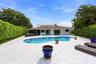 Discover your own private backyard sanctuary where modern luxury meets the natural beauty of Old Florida. Backing directly to a nature preserve, this 