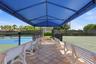 Enjoy one of the community's most popular amenities with beautifully maintained pickleball courts featuring covered seating, providing the perfect pla