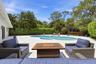 Discover your own private backyard sanctuary where modern luxury meets the natural beauty of Old Florida. Backing directly to a nature preserve, this 