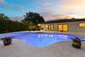 As the sun sets, this remarkable backyard transforms into a private evening retreat where luxury and nature exist in perfect harmony. Backing to a pro