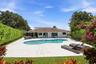 Discover your own private backyard sanctuary where modern luxury meets the natural beauty of Old Florida. Backing directly to a nature preserve, this 