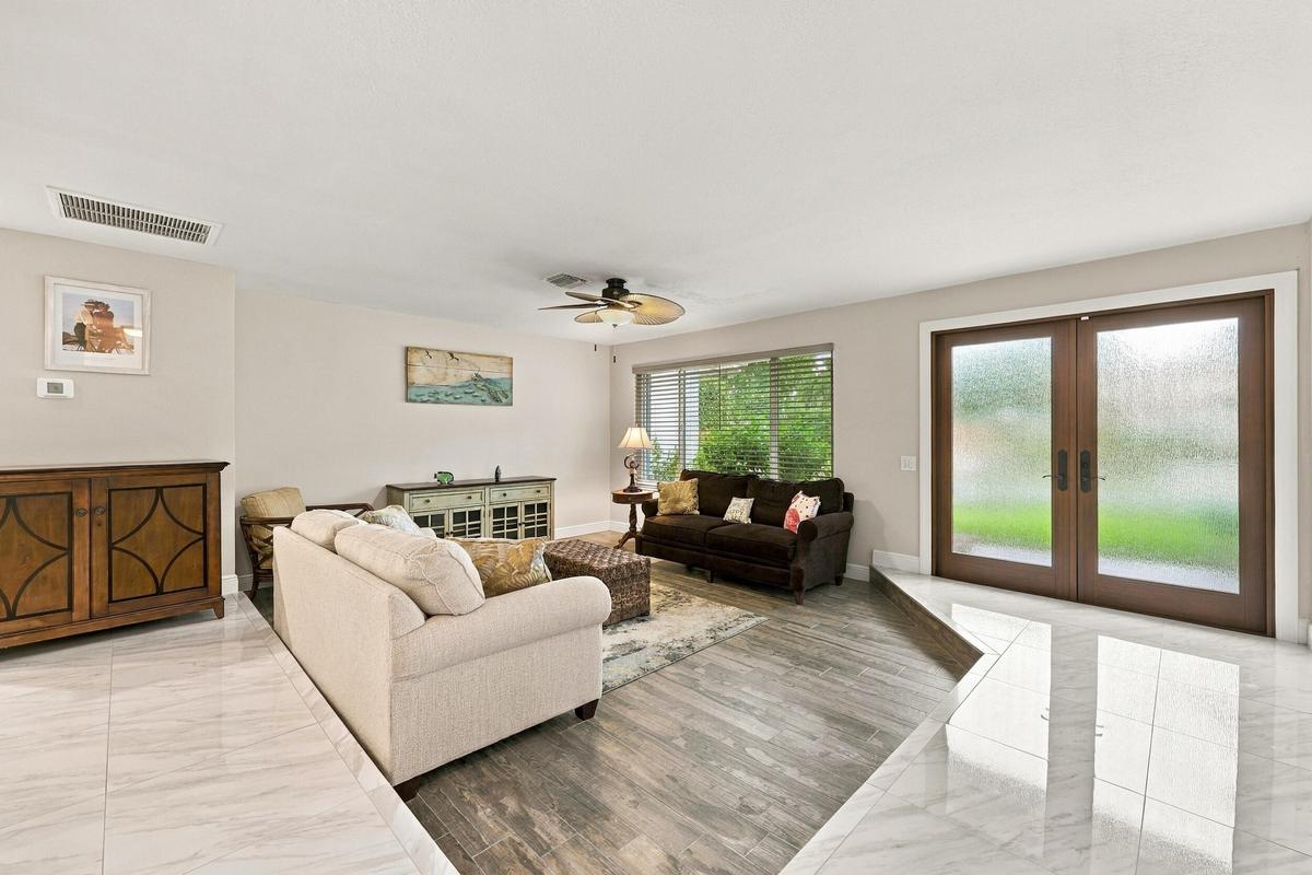 A spacious and versatile floor plan offers a formal living area that flows nicely into the updated kitchen and then into a family or bonus room. Every