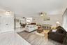 A spacious and versatile floor plan offers a formal living area that flows nicely into the updated kitchen and then into a family or bonus room. Every