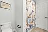 Bathroom 3 is a fully updated cabana bathroom with a new vanity, countertops, tile, and a tub and shower. Your guests will access it while spending da