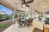 Live the epitome of the South Florida lifestyle with this 1,360 sq. ft. patio. It offers a built-in bar with quartz countertops, a grill area with hoo