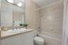 The guest bathroom includes a jetted tub.