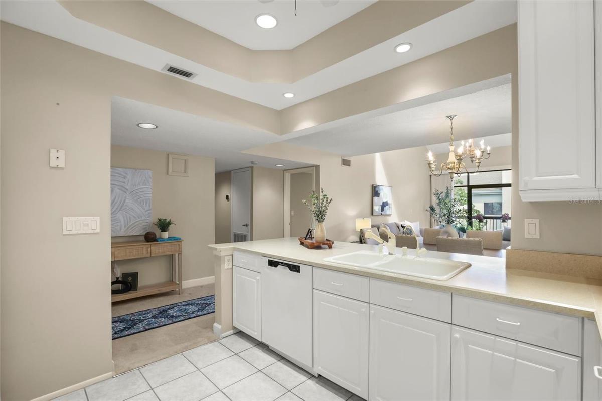 Like so many homeowners desire, this kitchen is open to living areas to create an inviting flow.