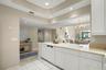 Like so many homeowners desire, this kitchen is open to living areas to create an inviting flow.