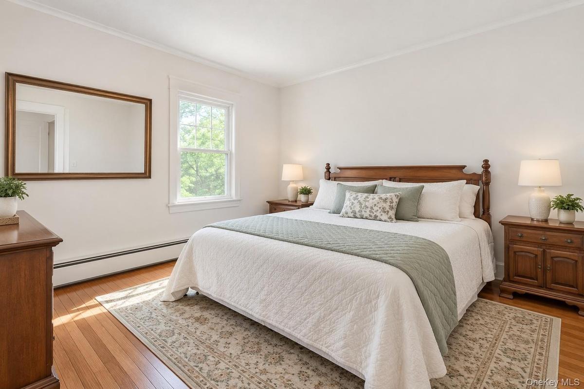 Virtually Staged Primary Bedroom (Master)This bright and inviting primary bedroom has been thoughtfully virtually staged to showcase its spacious layo