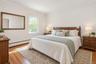 Virtually Staged Primary Bedroom (Master)This bright and inviting primary bedroom has been thoughtfully virtually staged to showcase its spacious layo