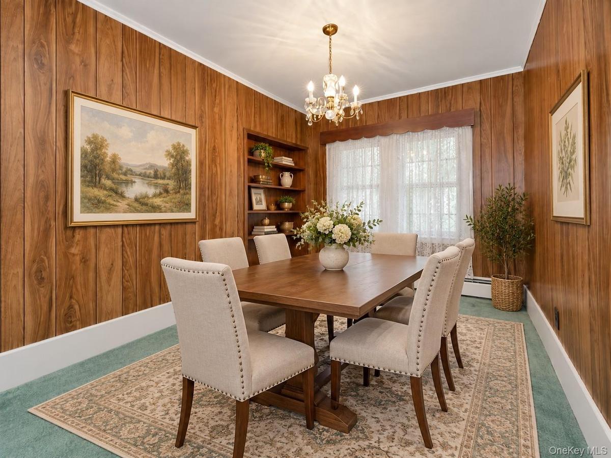 Virtually Staged Formal Dining RoomThis inviting formal dining room has been thoughtfully virtually staged to showcase its spacious layout and enterta