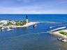 Across the street from the picturesque Hillsboro Inlet.