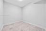 Den currently used as office and storage, easily a 3rd bedroom