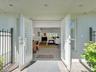 Double French doors with louvered panels.