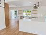 Kitchen with illuminated shelving