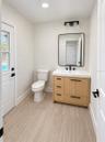 Half bathroom with exterior access