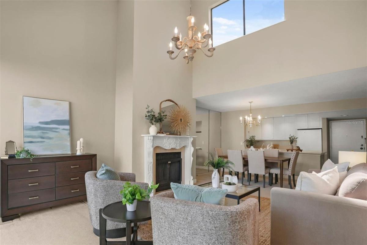 Great sightlines from the living room, dining room, and kitchen create an open feel that is ideal for entertaining.