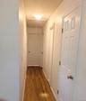 Pull down stairs provide easy access to additional space.