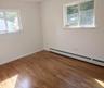 All rooms boast fresh paint, newer windows with white trim...