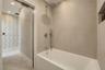 Calming Shared Bathroom with deep bathtub