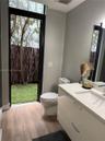 First Floor bathroom with exit to the pool!