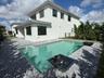 Pool Package With Extensive Paver Patio (Pictures Are Not Of Actual Home)