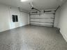 Garage With Epoxy Floor And Tankless Hot Water Heater (Pictures Are Not Of Actual Home)